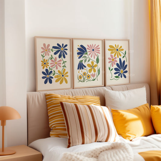 Set of three abstract floral prints with mustard yellow, navy blue and blush pink flowers on light beige, great above bed decor