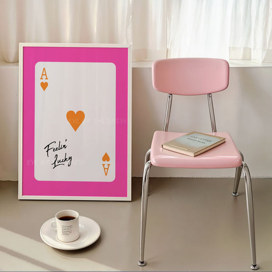 Modern ace of hearts poster with positive quote "Feelin' Lucky" in bright pink and orange
