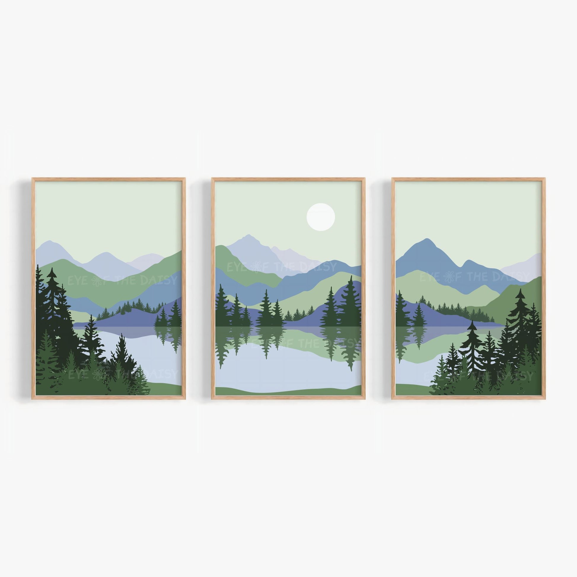 Set of 3 sage green blue landscape printable wall art prints, showing a mountain scene with trees and a lake in mid century modern style