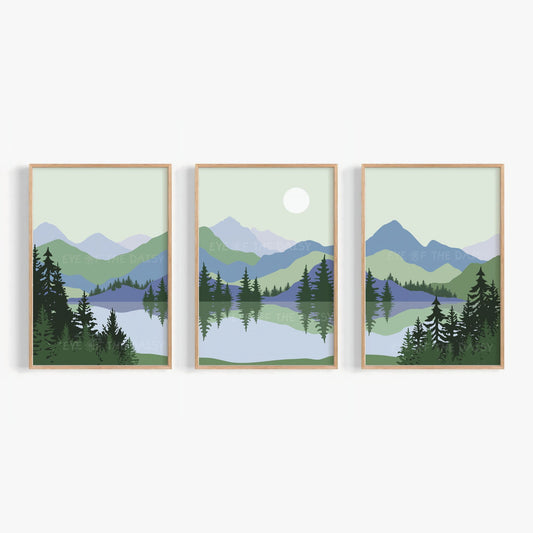 Set of 3 sage green blue landscape printable wall art prints, showing a mountain scene with trees and a lake in mid century modern style