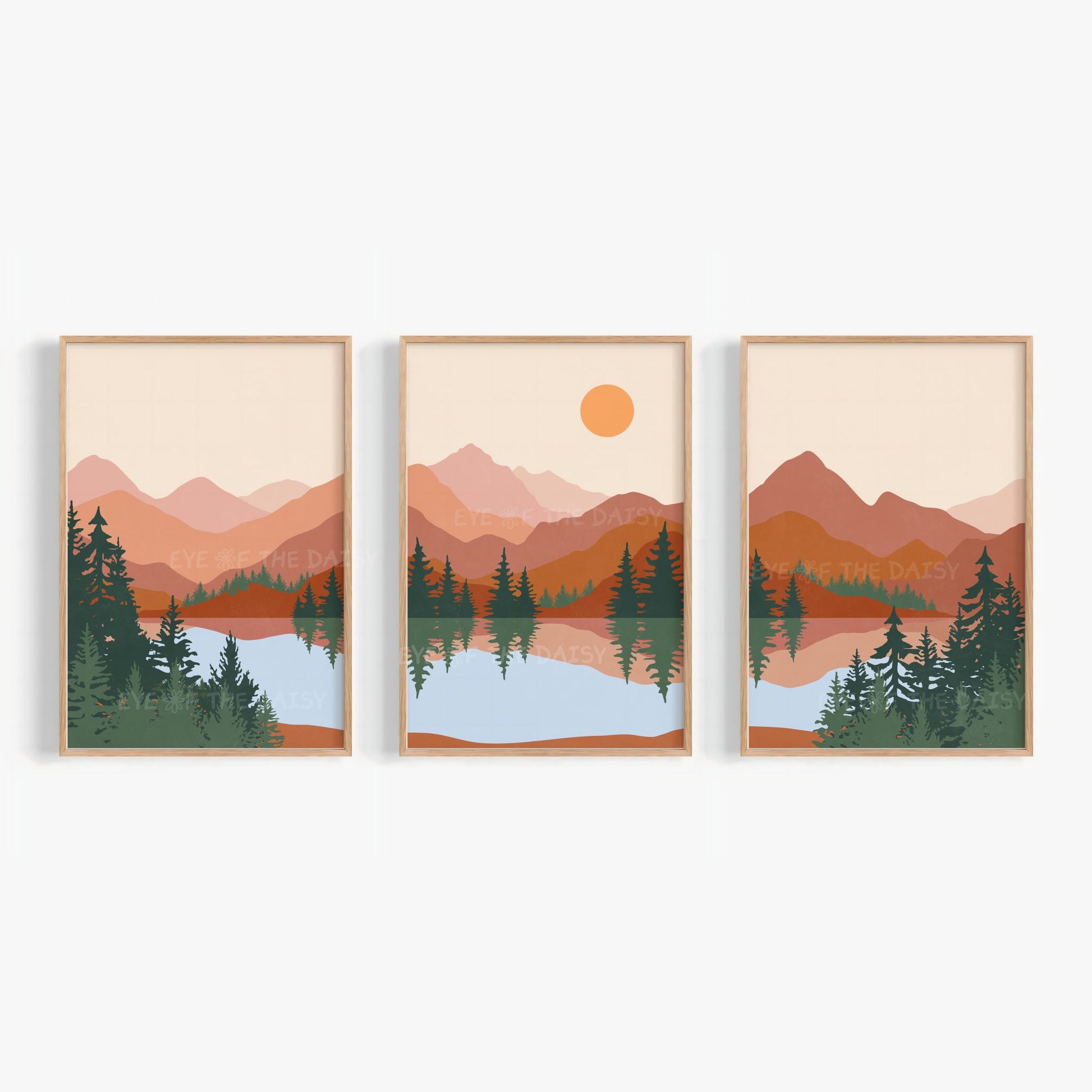 Set of 3 boho prints of a minimal mountain landscape scene with trees and water, in terracotta, burnt orange, forest green, earth tones