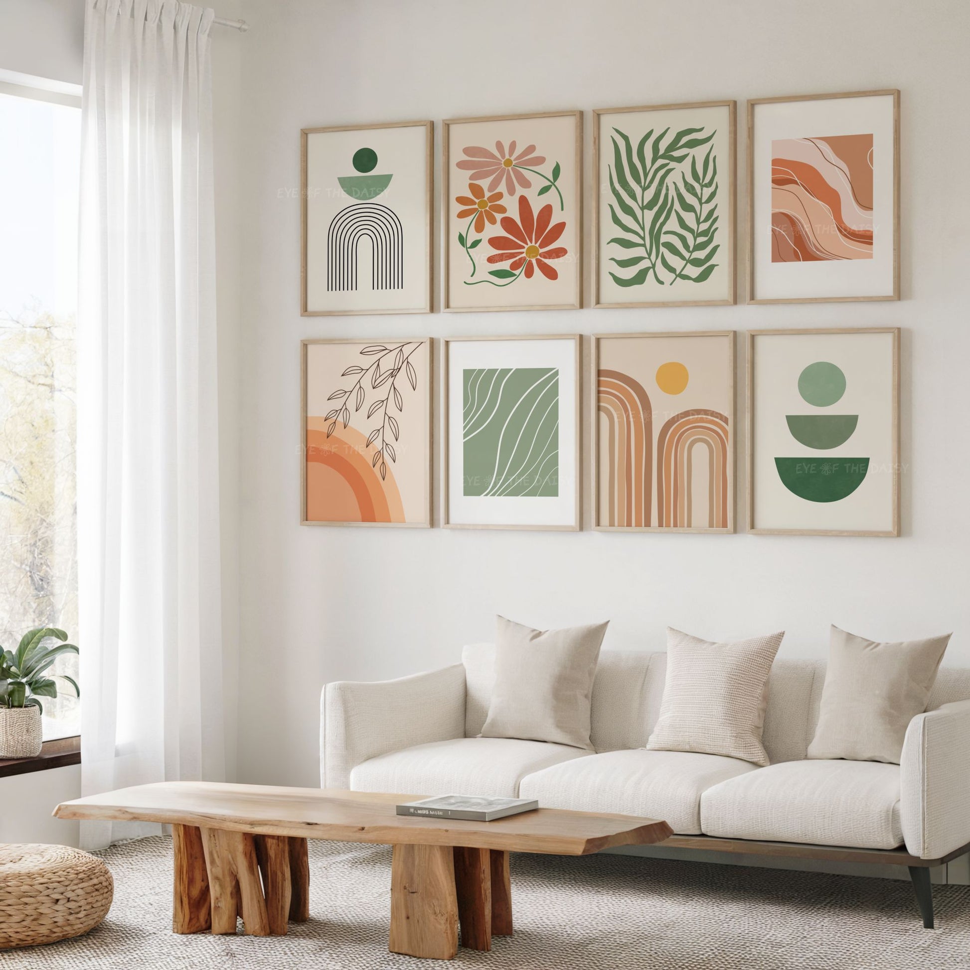 Nine piece wall print set of earth tone boho artwork in terracotta, beige, burnt orange, sage green and dark green, in a boho living room