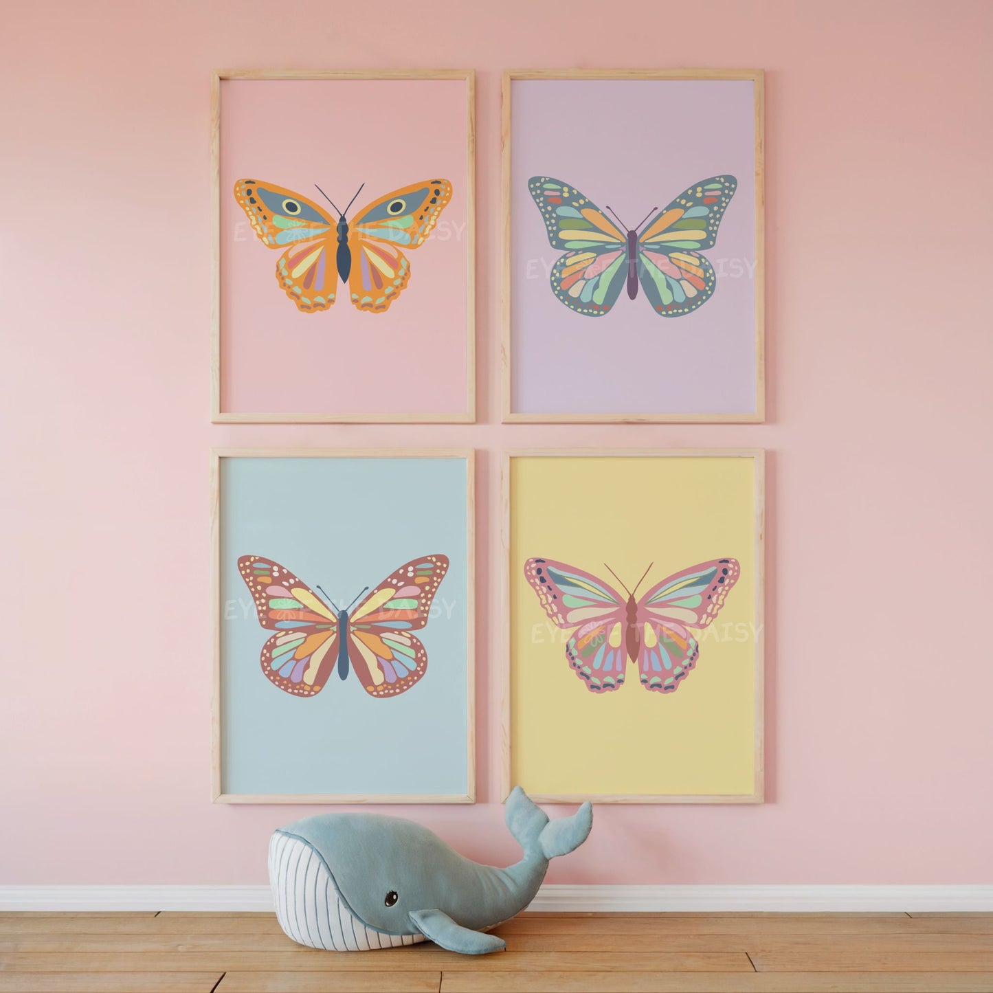 Set of 4 pastel colourful bohemian butterfly poster printables displayed in  a children's room