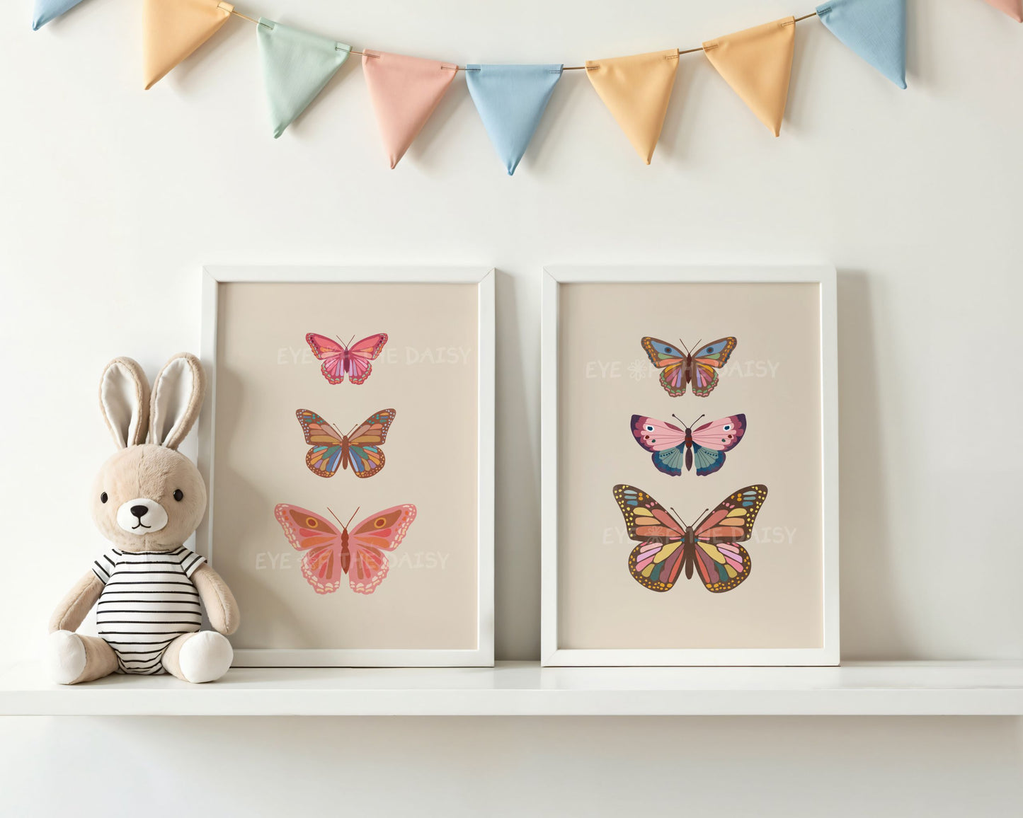 Two neutral butterfly prints on a shelf in a gender neutral nursery room, makes great children's room wall decor