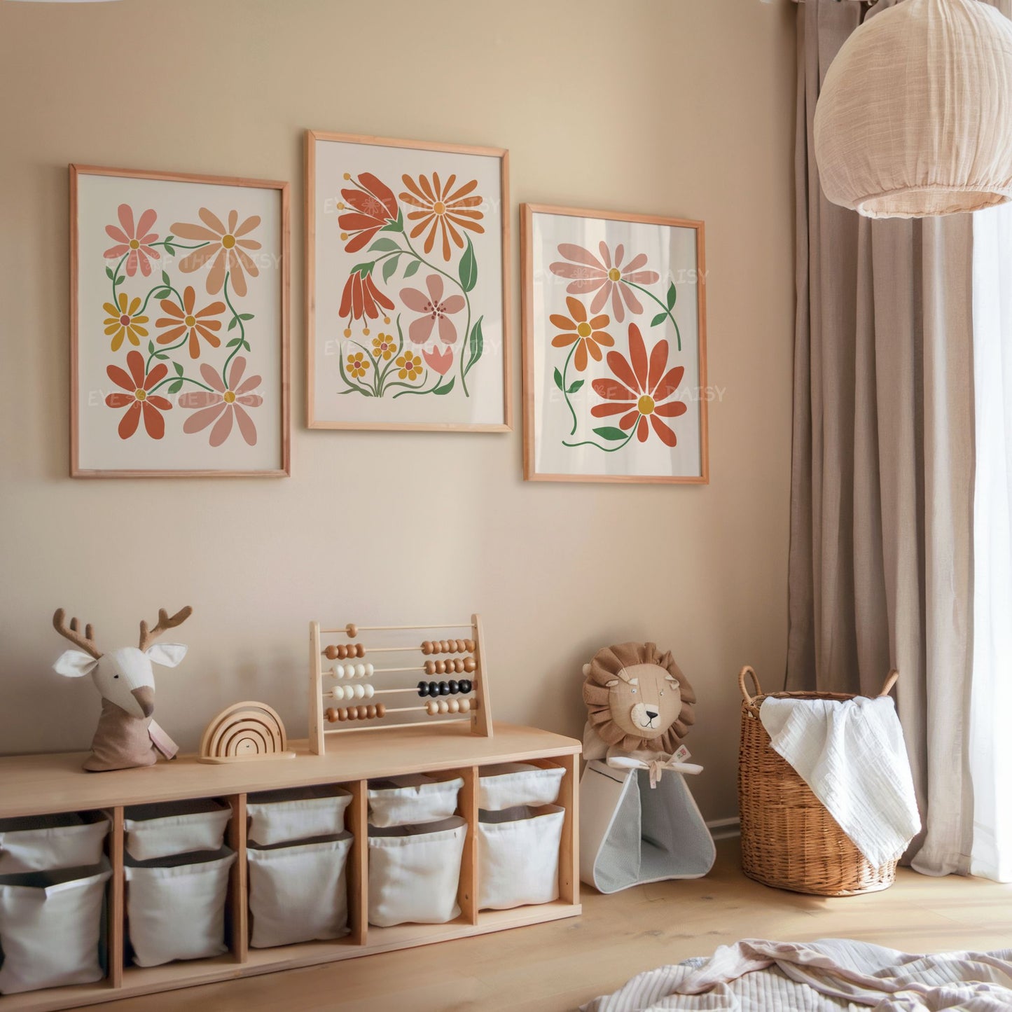 Triptych set of three abstract botanical downloadable wall art prints in earth terracotta rust tones on beige in a children's boho bedroom