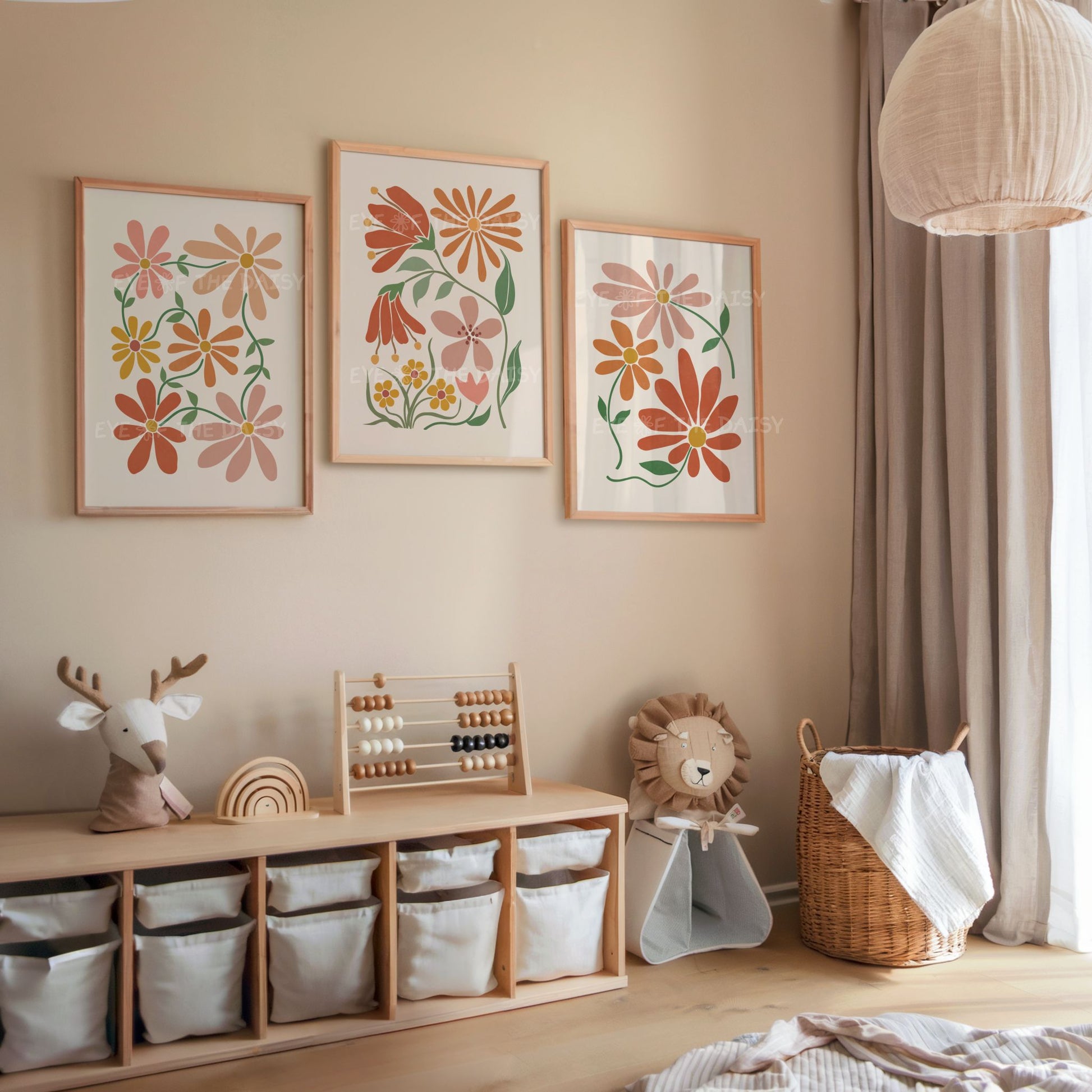 Triptych set of three abstract botanical downloadable wall art prints in earth terracotta rust tones on beige in a children's boho bedroom