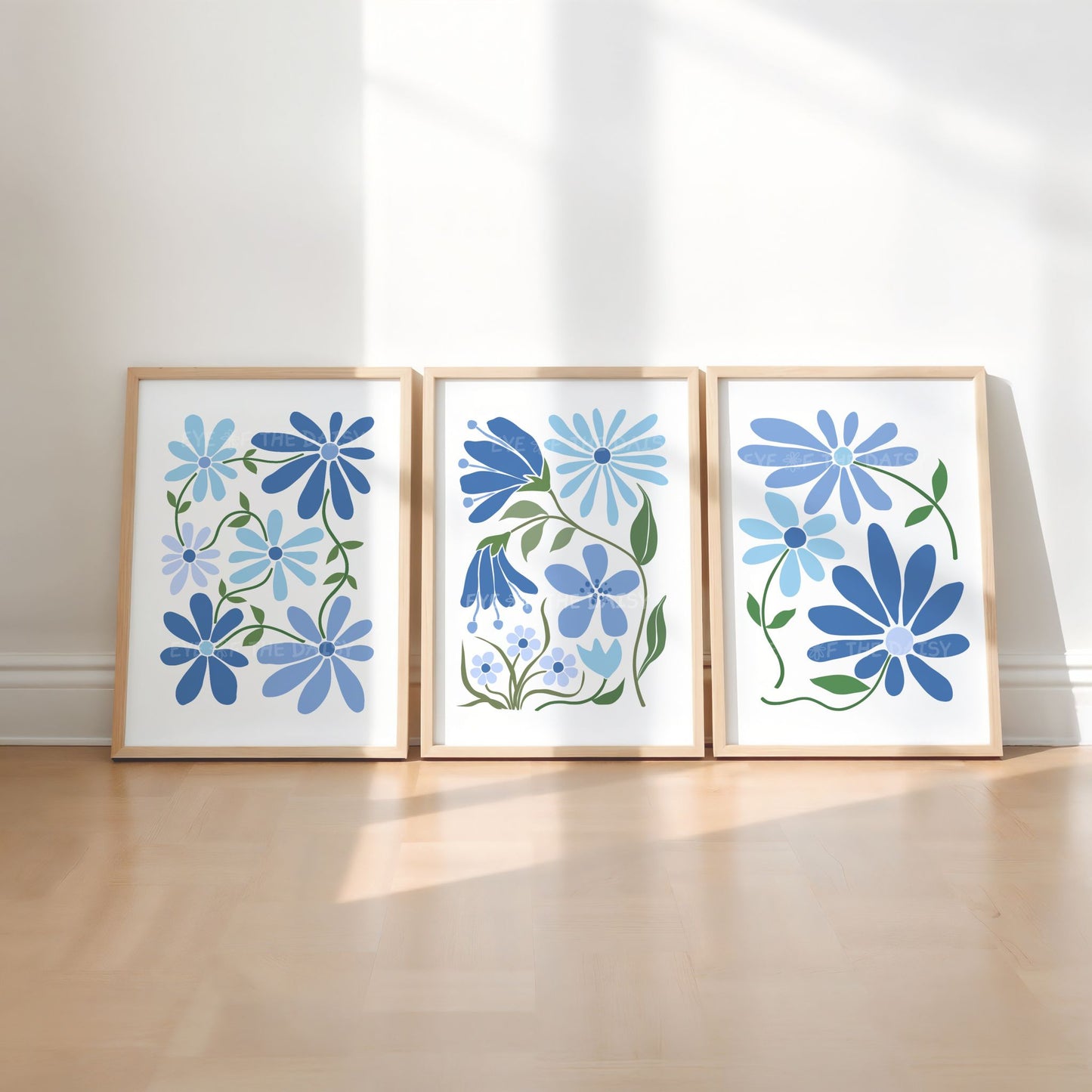 Three piece trendy abstract floral prints with blue flowers on a white background, great for trendy apartment or dorm decor