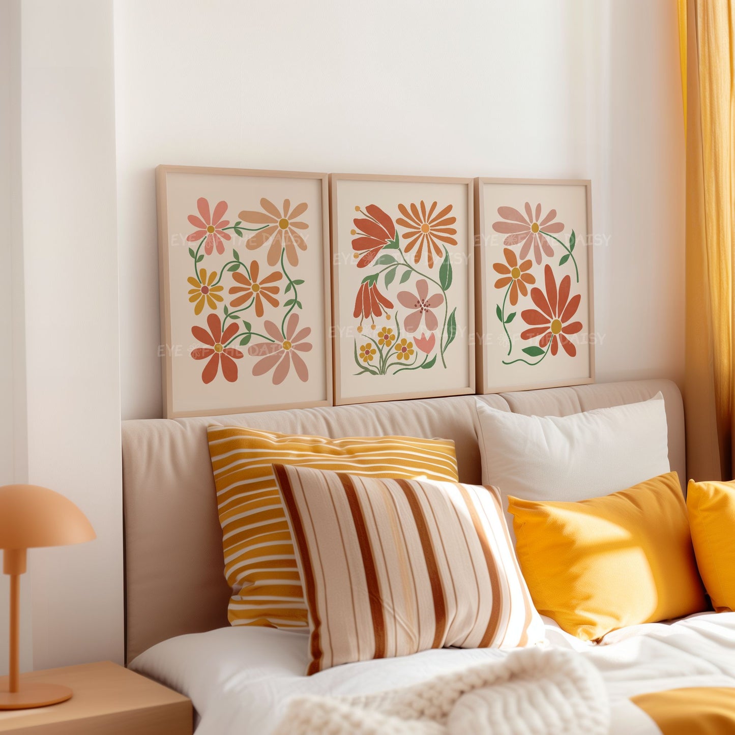 Three piece trendy abstract floral wall art prints in terracotta, mustard, burnt orange and boho earthy tones on beige, great above bed decor