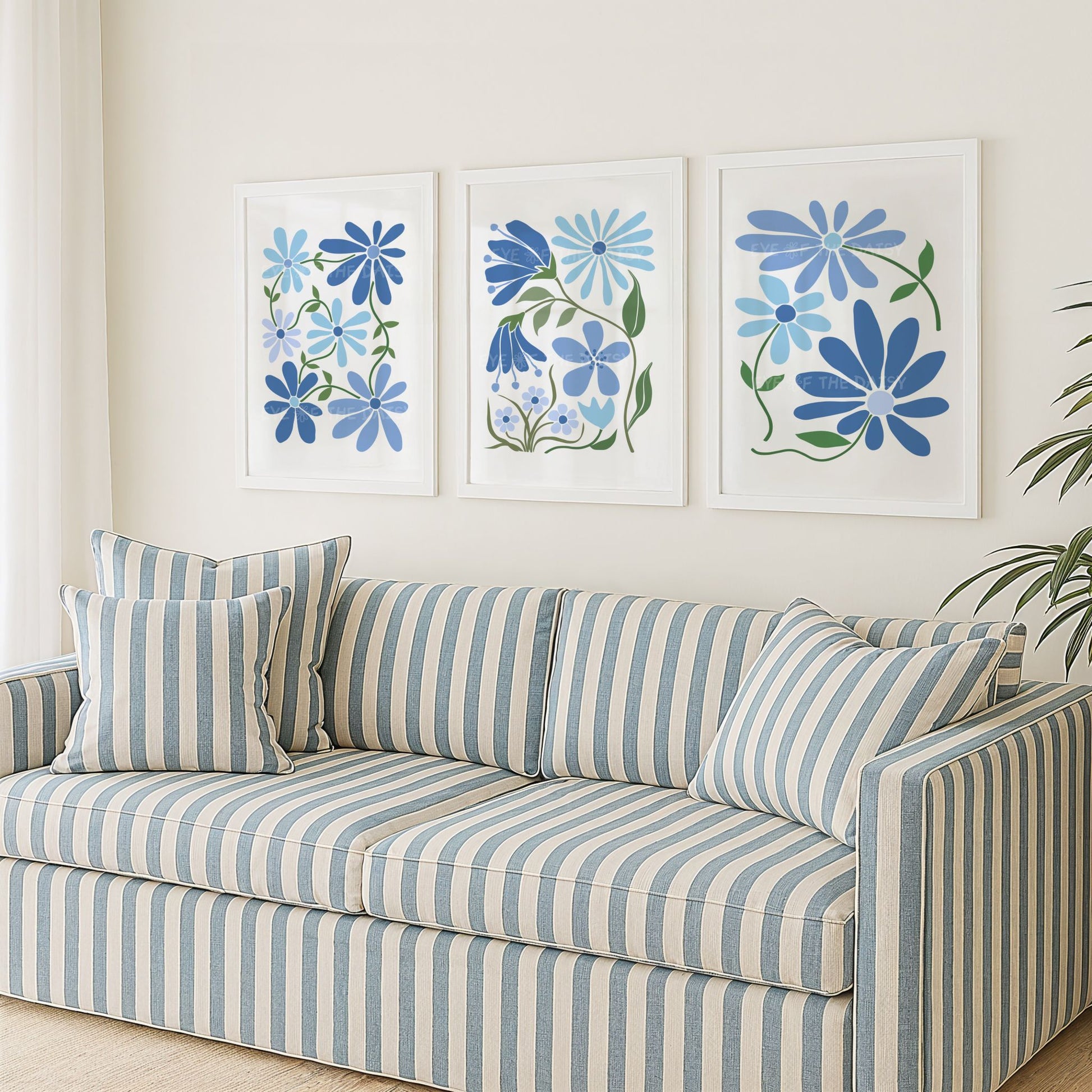 Set of three trendy blue floral prints of stylized abstract flowers on white, perfect for fresh modern living room wall decor