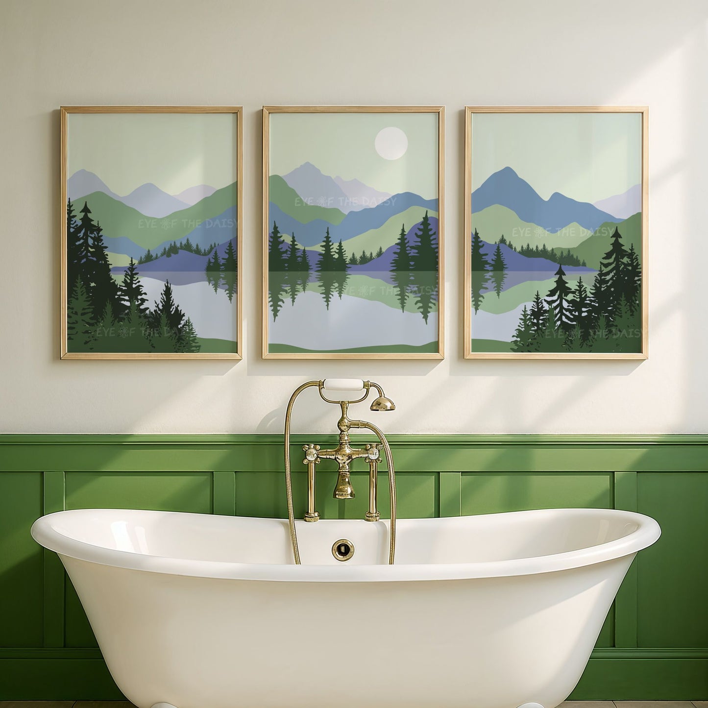 Set of 3 mid century modern abstract landscape prints, in calming sage green and blue tones, of a mountain scene with trees and a lake, in an eclectic green bathroom
