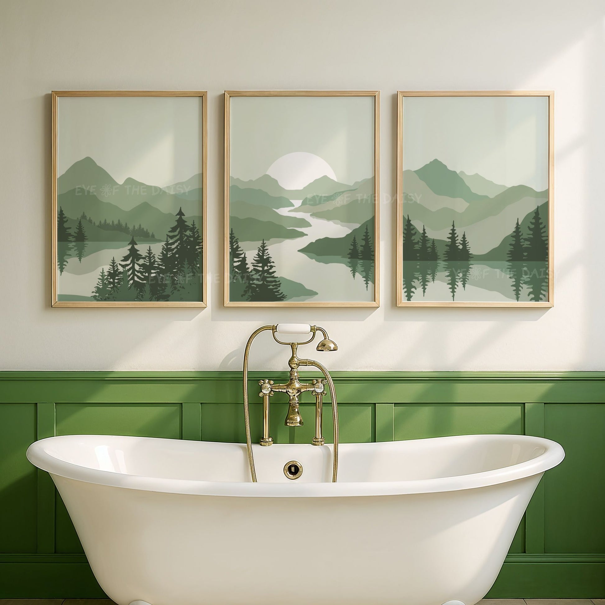 Set of 3 wall art prints of sage green abstract mountain scenery with trees and a lake, displayed on the wall of a green modern bathroom