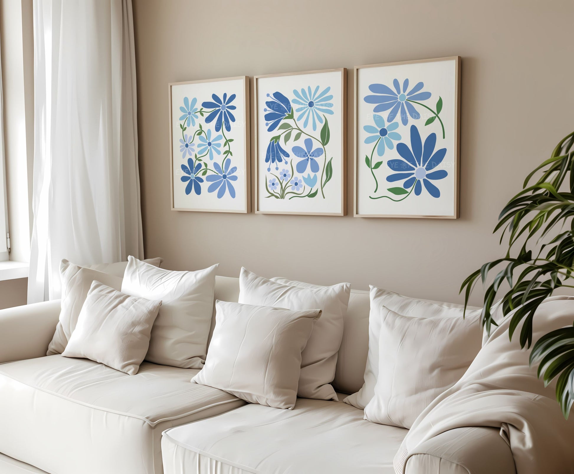 Set of three abstract botanical wall prints of stylized flowers in different blues on white, perfect poster set for a modern living room
