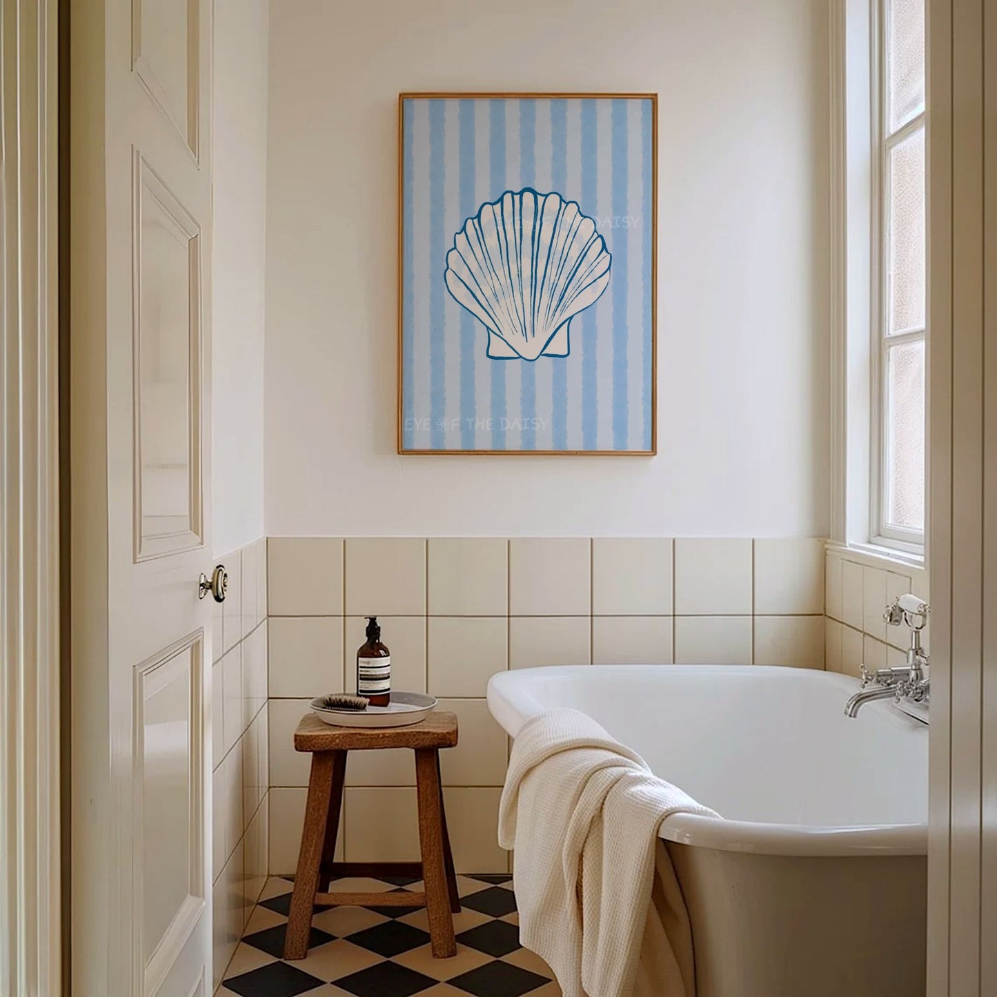 Trendy blue white shell wall decor in a modern coastal bathroom - great for Hamptons or beachy room decor