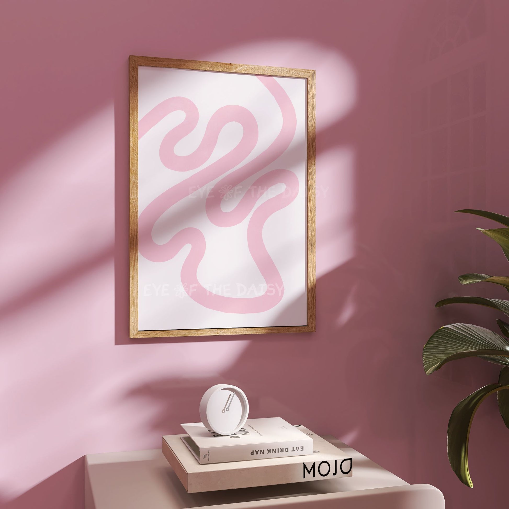 Modern printable wall art of a contemporary abstract line art design in pastel pink and white for a trendy apartment