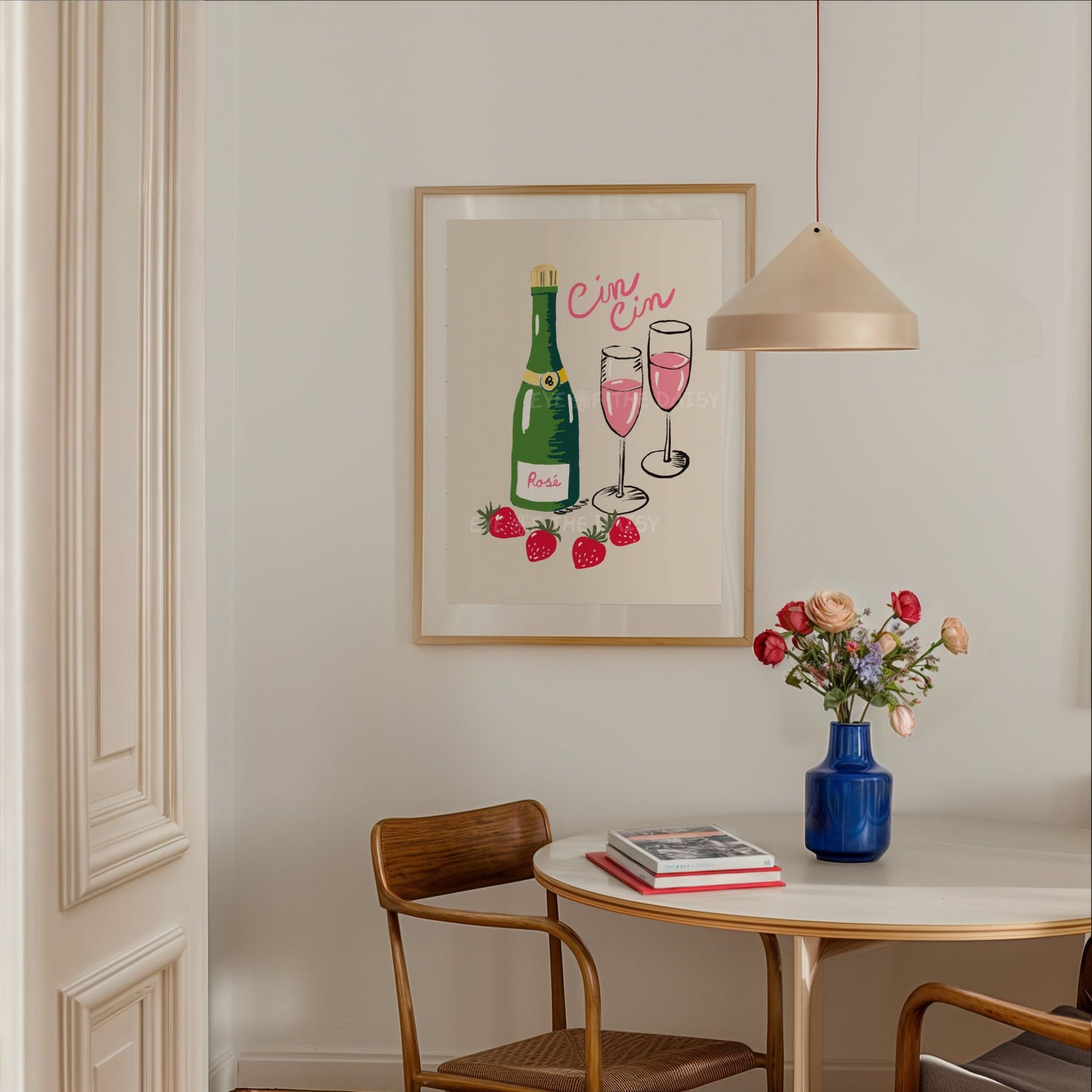Rosé wine poster, with two pink champagne glasses, wine bottle and the Italian quote "Cin Cin" in a trendy apartment