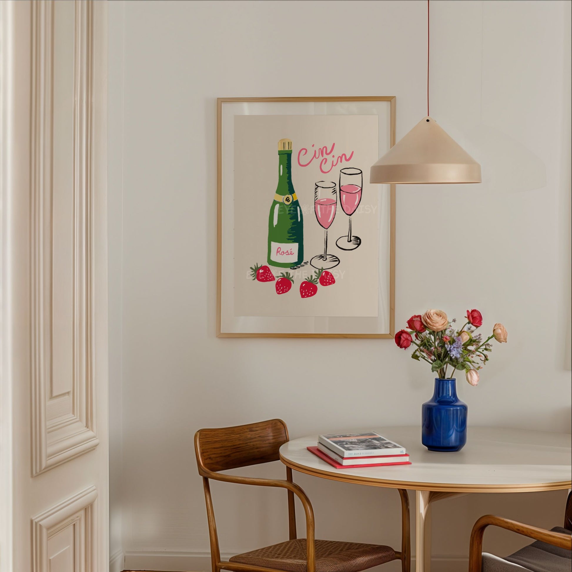 Rosé wine poster, with two pink champagne glasses, wine bottle and the Italian quote "Cin Cin" in a trendy apartment