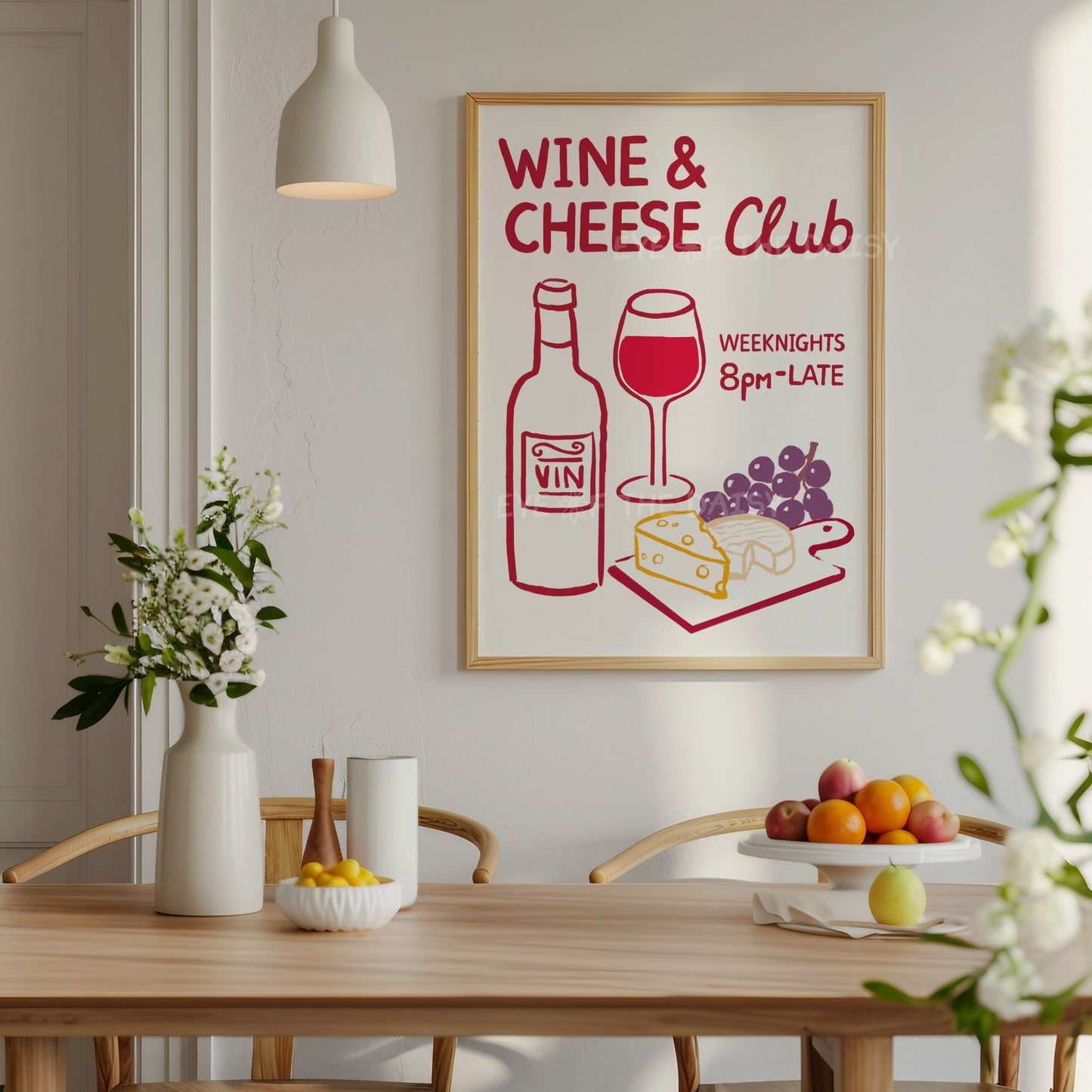 A 'Wine & Cheese Club' colourful contemporary art print on the wall in a kitchen or dining room