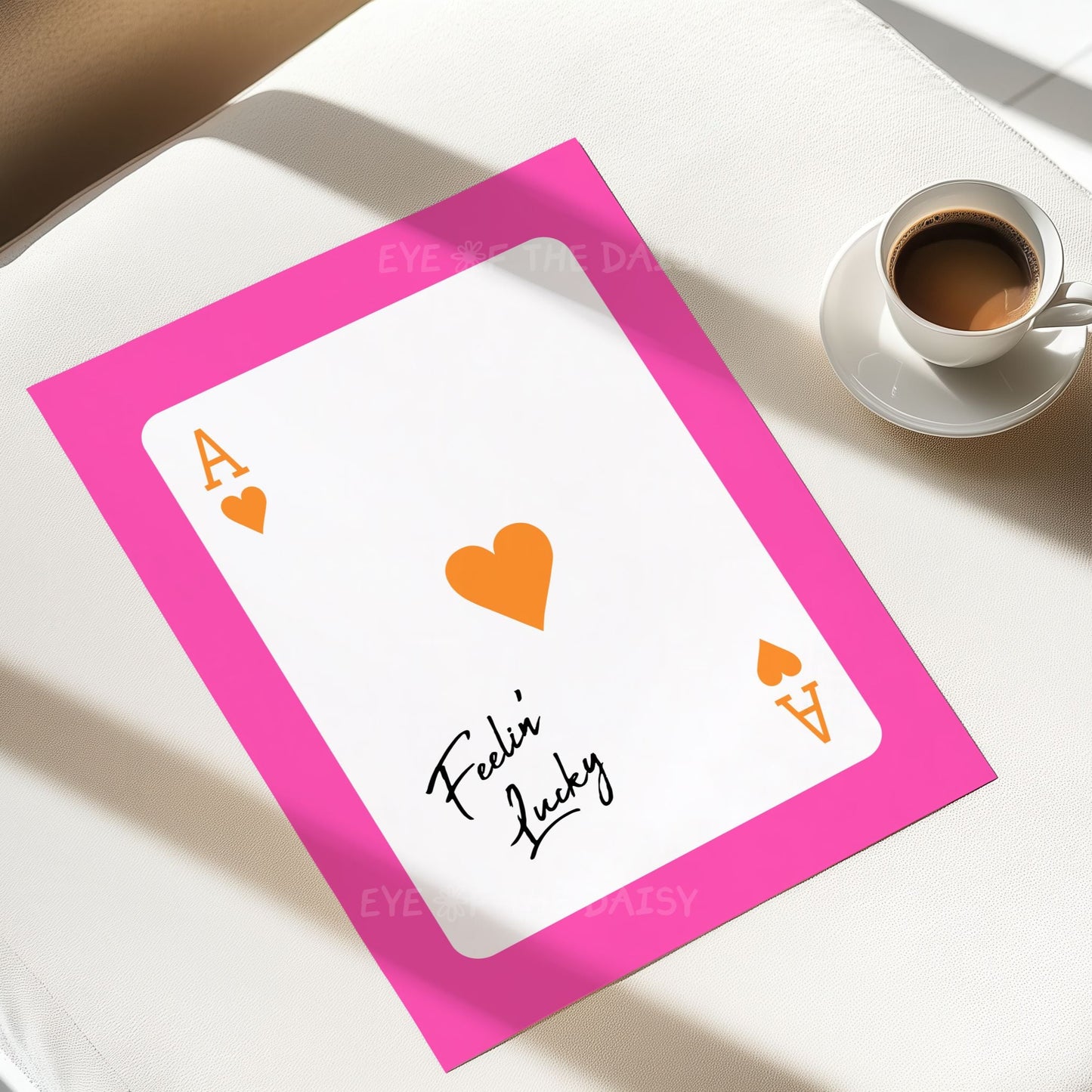 Trendy boho playing card printable poster with ace of hearts design in pink and orange, and phrase "Feelin Lucky"