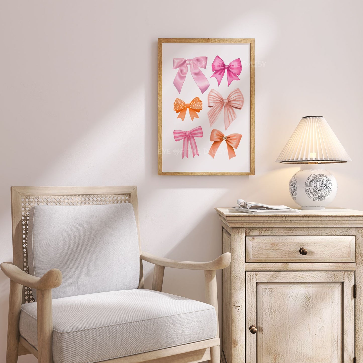Balletcore themed watercolor bows & ribbons art print in pink & orange, displayed in a cozy shabby chic bedroom