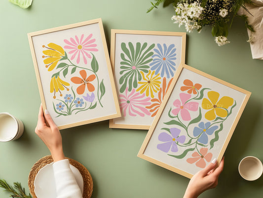 A set of three vibrant botanical abstract digital prints with colorful retro abstract flower cut-outs in pastel pink, mustard yellow, green, lilac