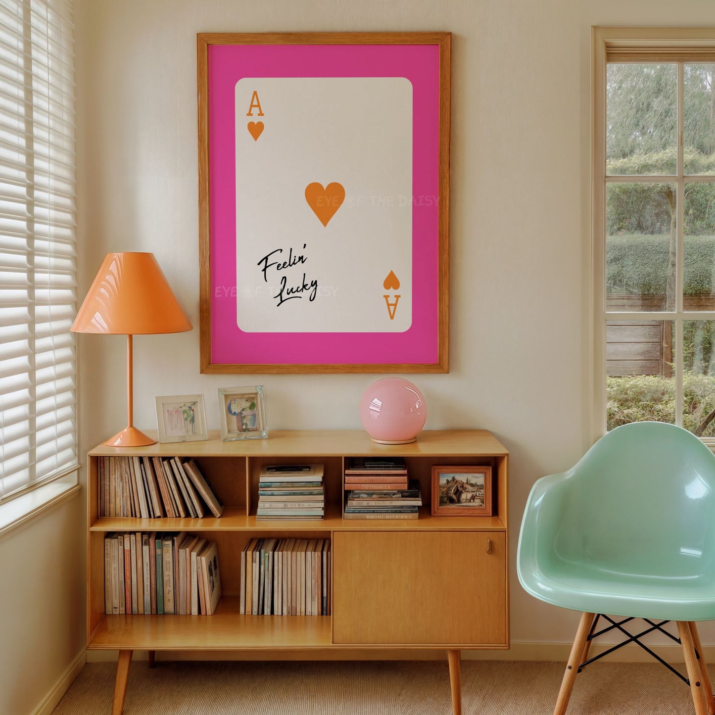 Trendy girl's bedroom wall art print of a pink and orange ace of hearts playing card with "Feeling Lucky" quote