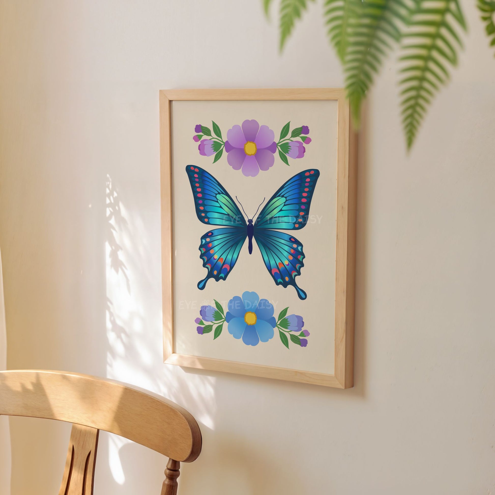 Cute boho wall art print of a vibrant blue butterfly and flowers