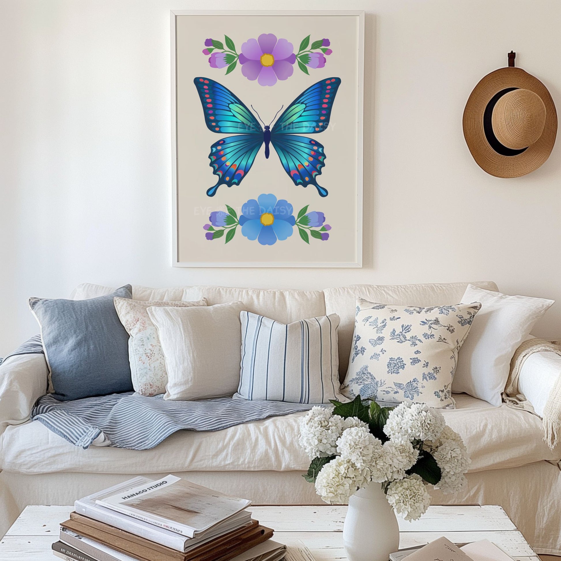 Digital art print of a trendy colourful vibrant blue butterfly with flowers in a vintage farmhouse style living room