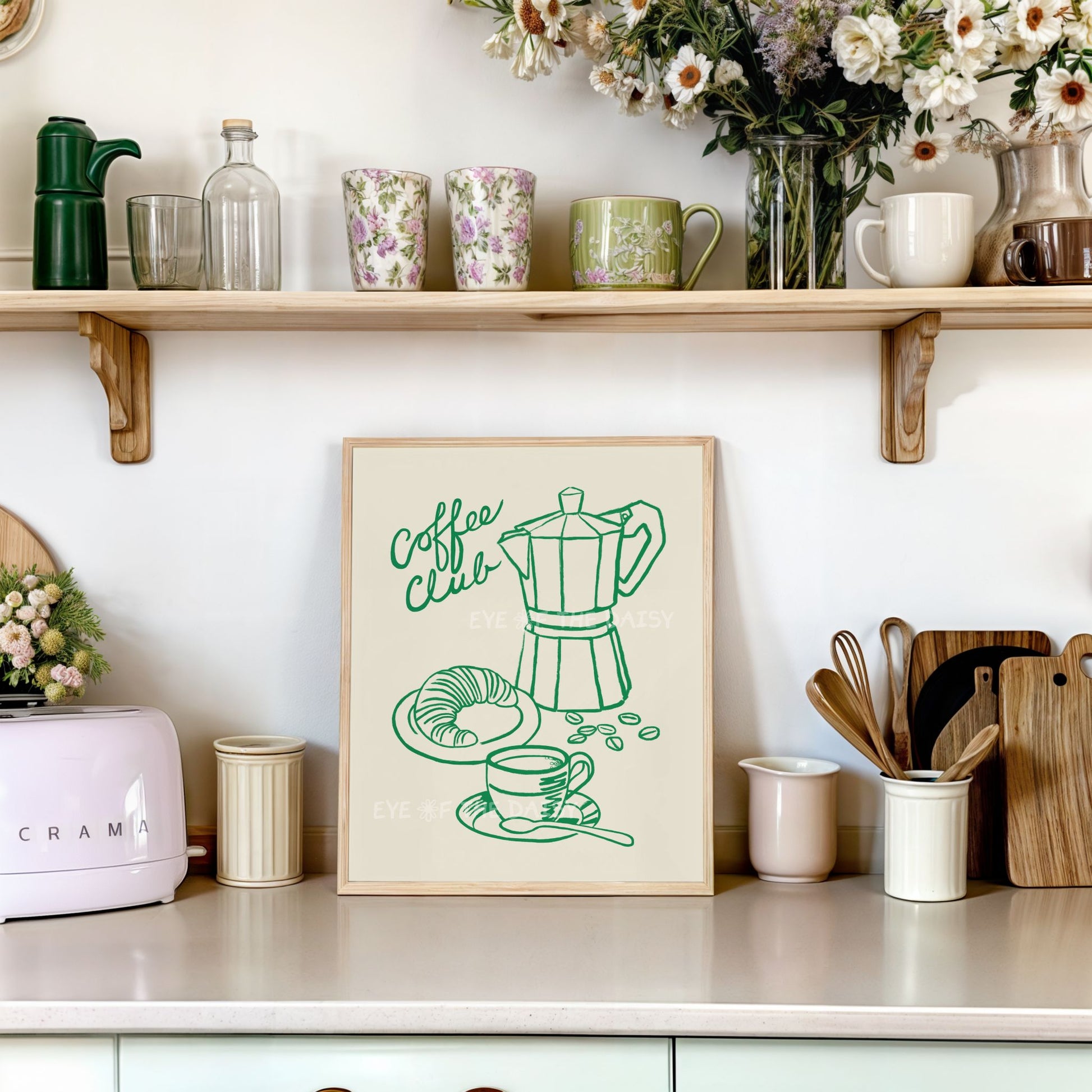 "Coffee Club" printable wall art print of a green hand drawn sketch of a Moka coffee pot, croissant and coffee cup on beige with the phrase "Coffee Club"