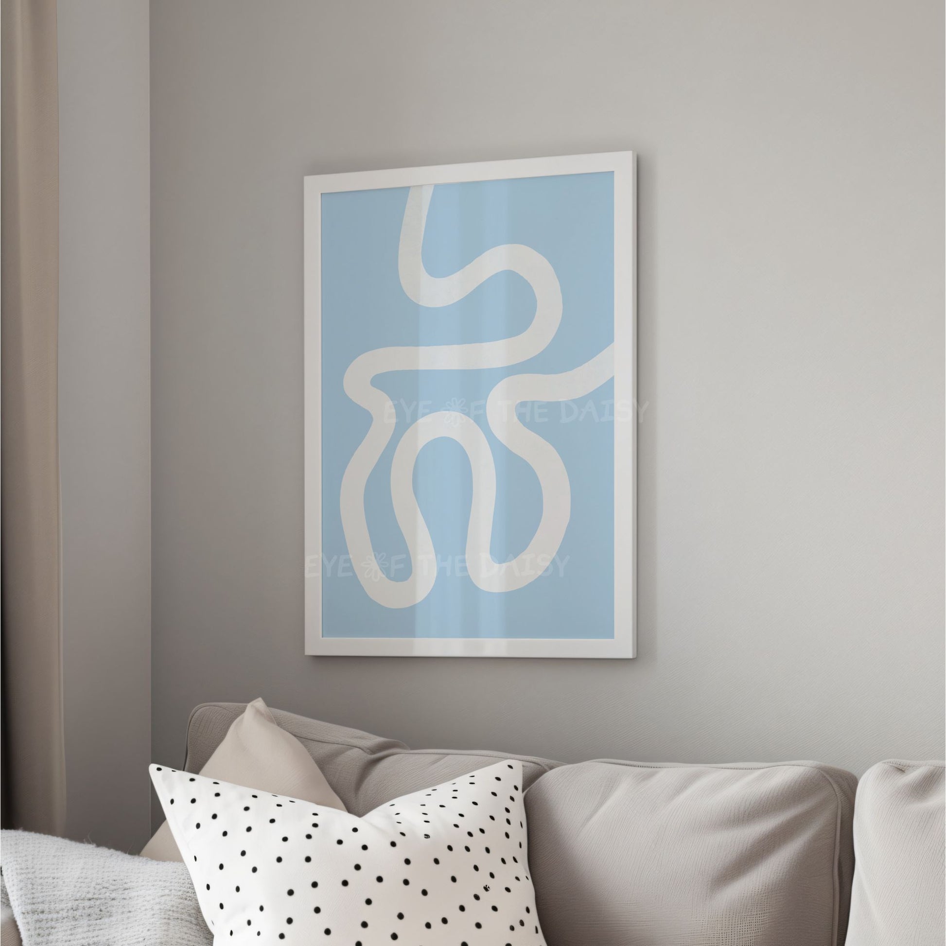 Abstract printable wall art with wavy lines on a light blue background in a modern living room