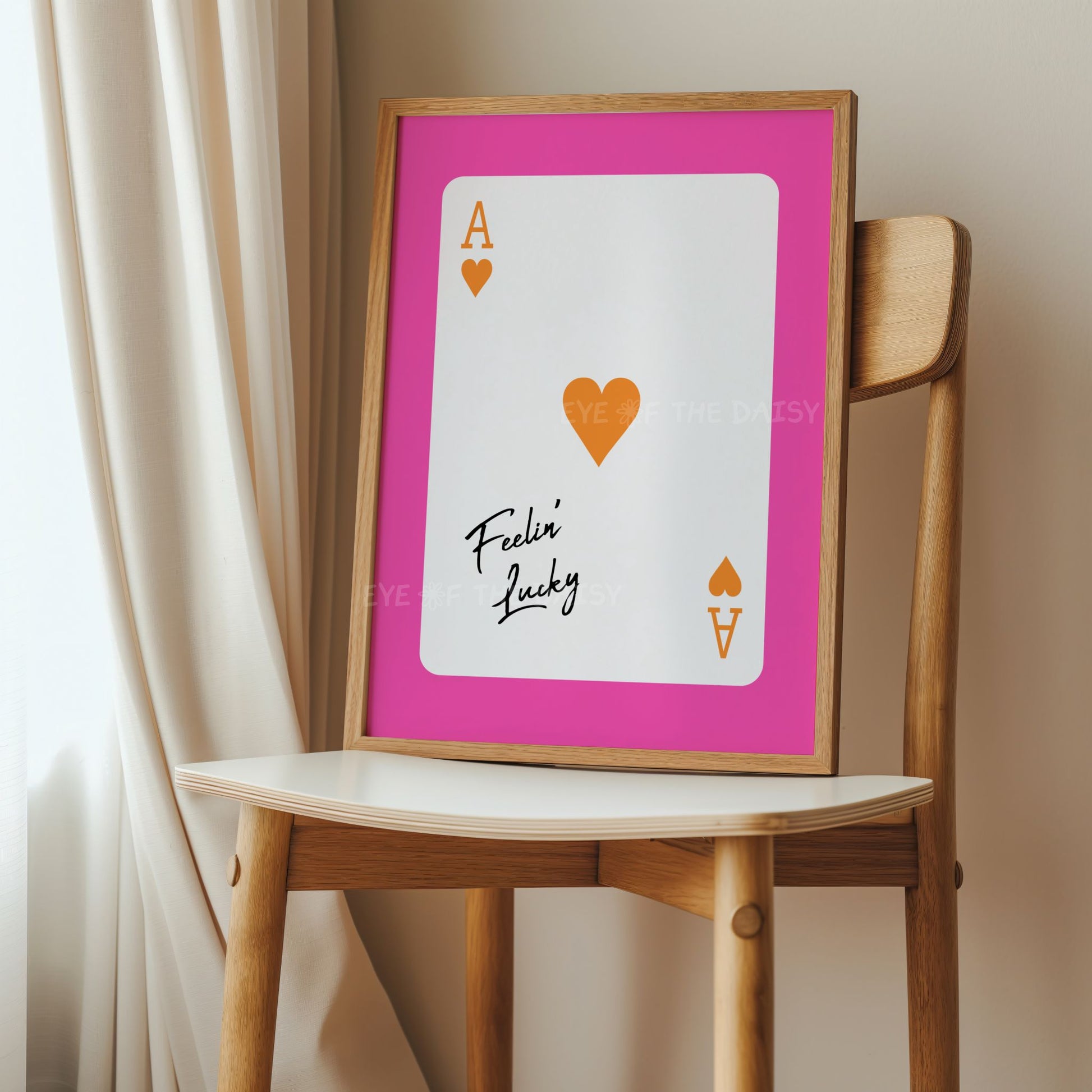 Cute framed playing card print with 'Feelin' Lucky' positivity phrase in pink and orange