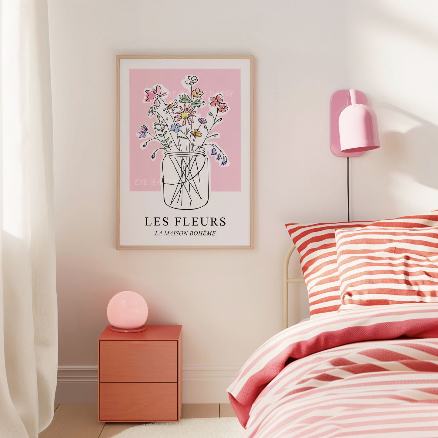 Pastel pink 'Les Fleurs' exhibition poster on the wall of a girly feminine bedroom or dorm room