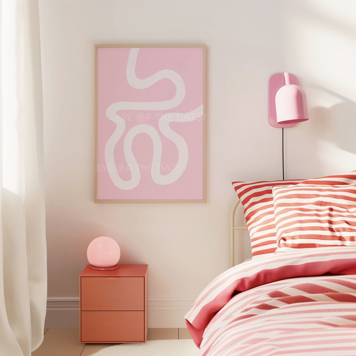 Modern abstract printable wall art with wavy lines on a pastel pink background in a trendy bedroom
