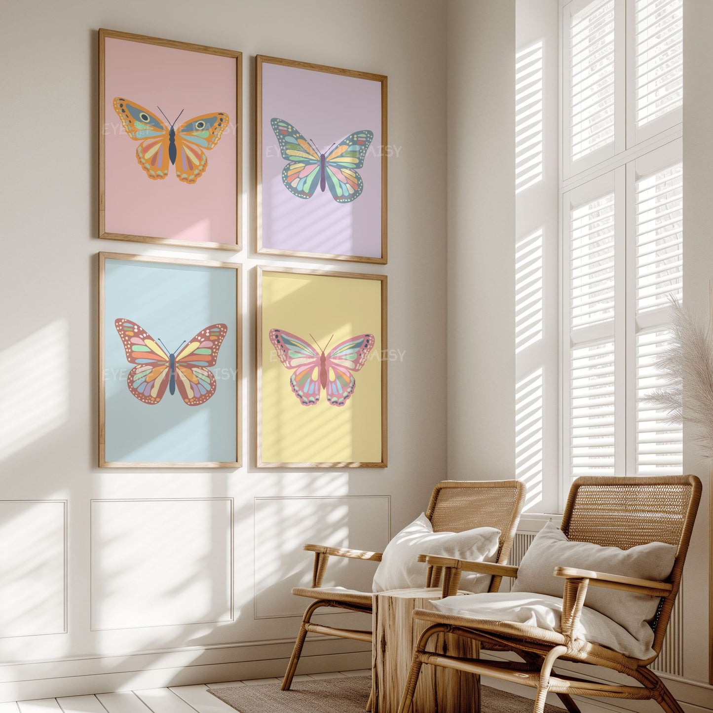 Eclectic vintage butterfly art prints set of 4 in pastel pink, yellow, orange, sky blue and lilac colours, on the wall of a boho nursery room