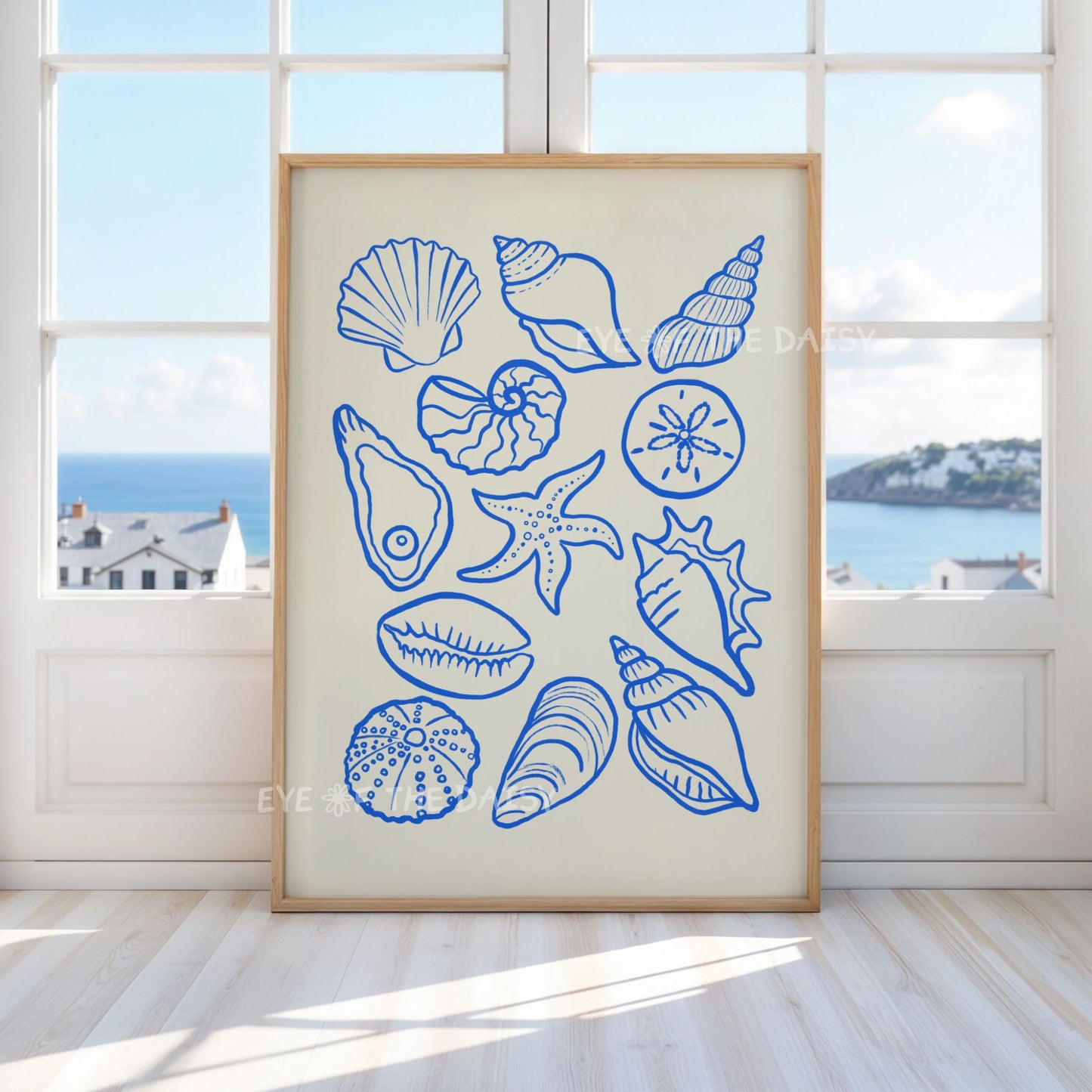Sea shells digital download art print displayed in a modern trendy coastal living room