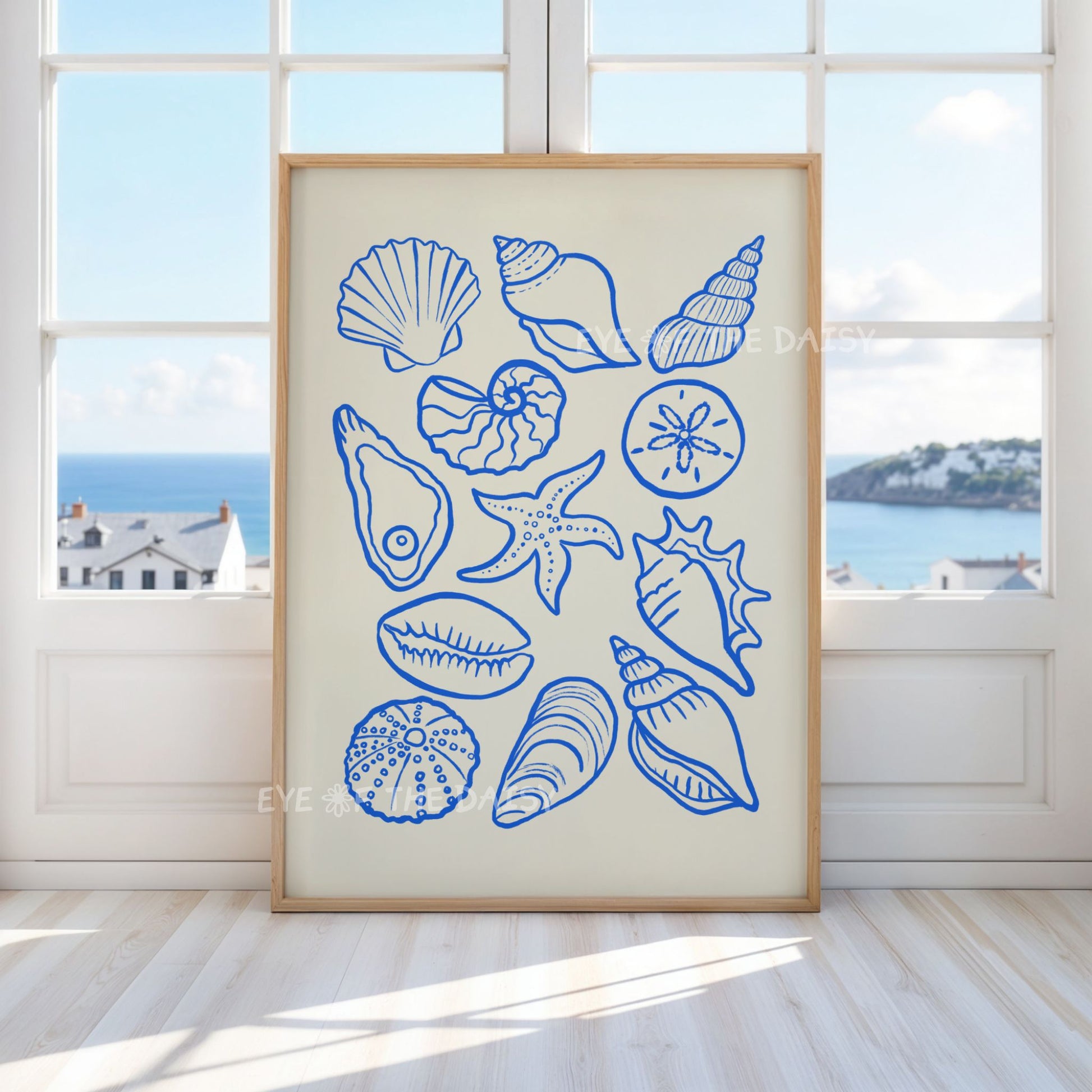 Sea shells digital download art print displayed in a modern trendy coastal living room